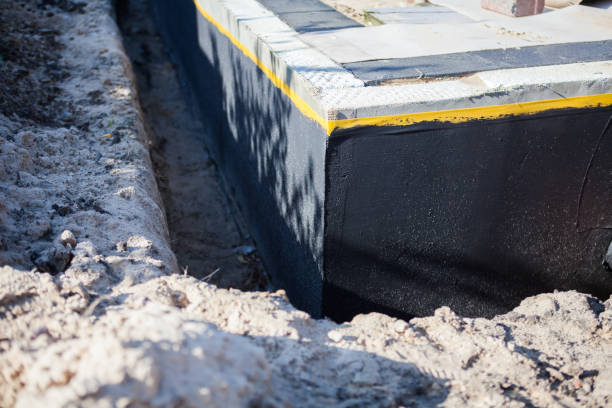 Professional Emergency Waterproofing technician working in Burnettsville, IN